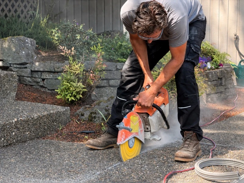 Slabtown Pressure owner cutting concrete during a project